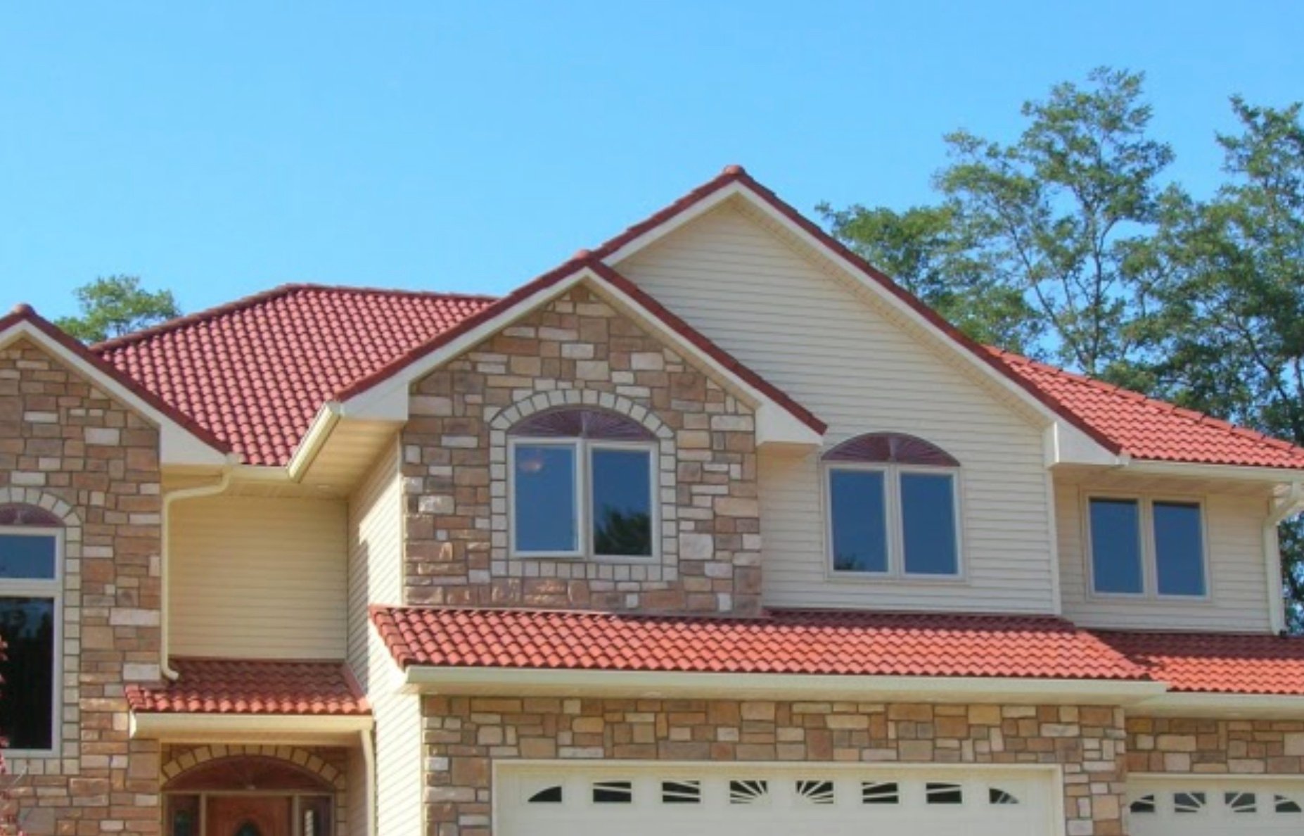 7 Home Designs Using an Orange Tile Roof - Brava Roof Tile